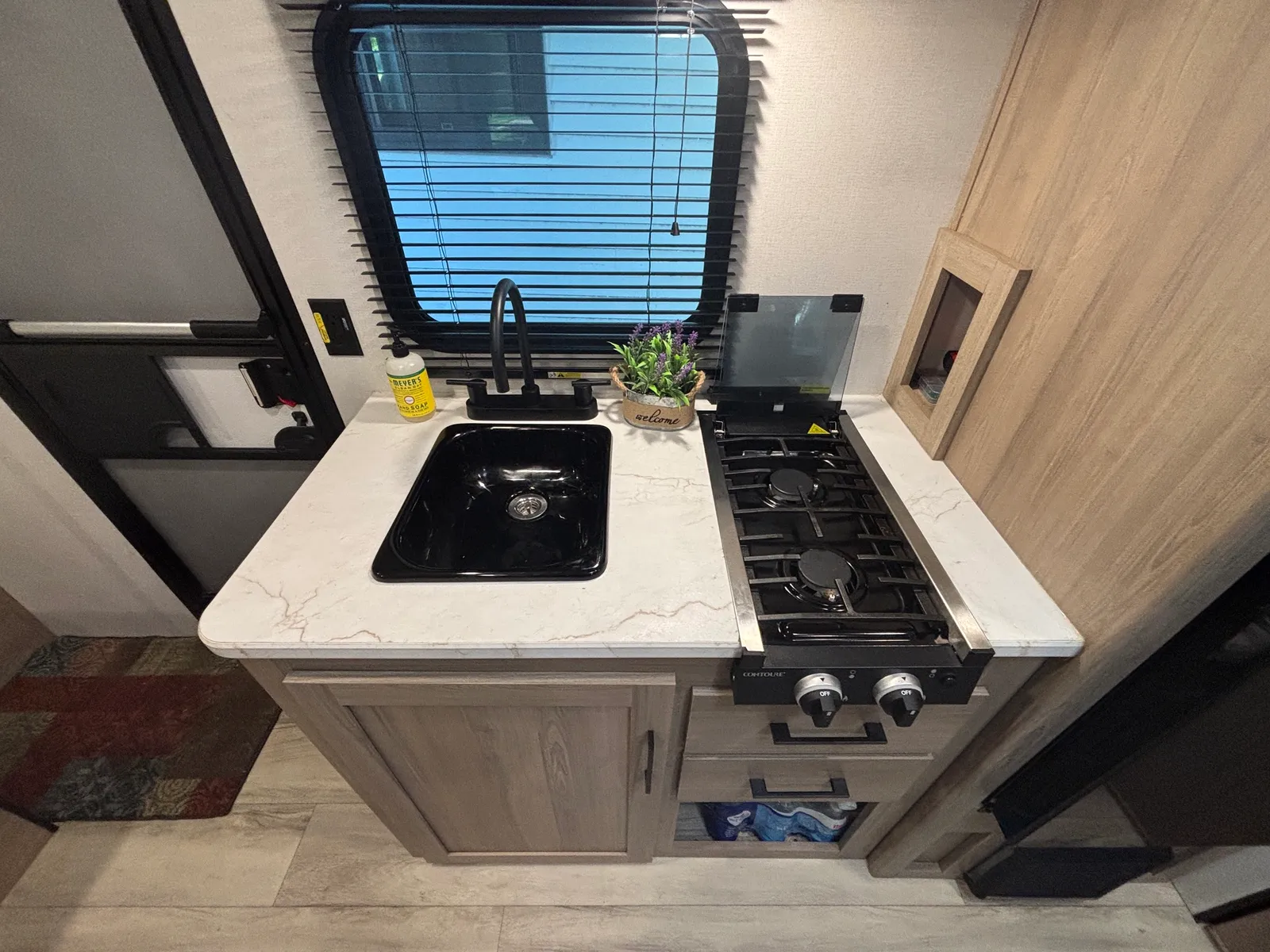 The kitchen with the flush cooktop upgrade
